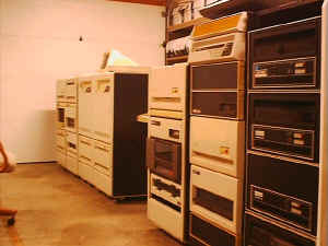 [photo: a row of DEC racks filled with computers]